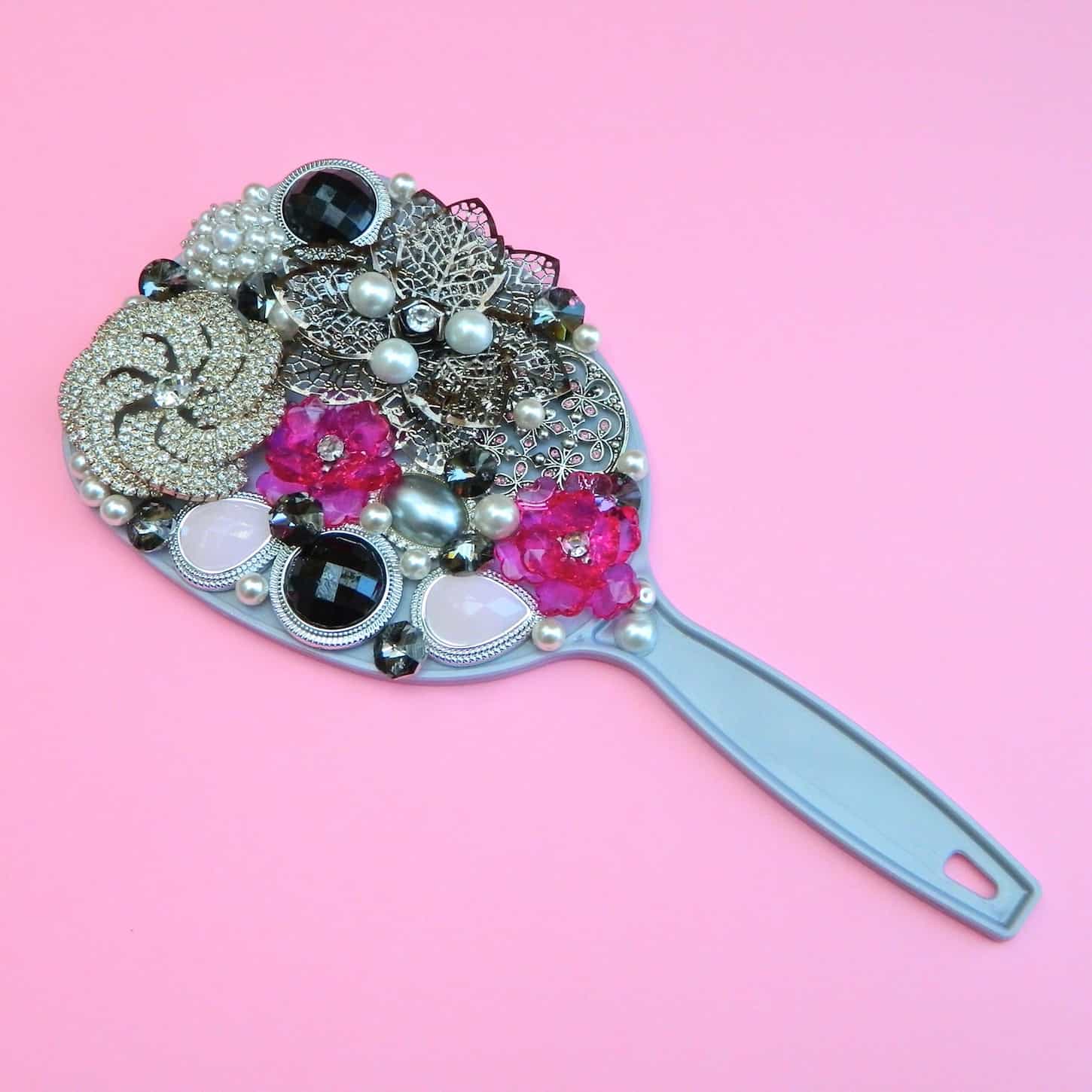 Fancy broken earring hand mirror