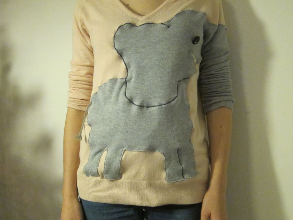 Elephant sweater with a trunk sleeve