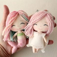 Miniature felt angel and mermiad dolls
