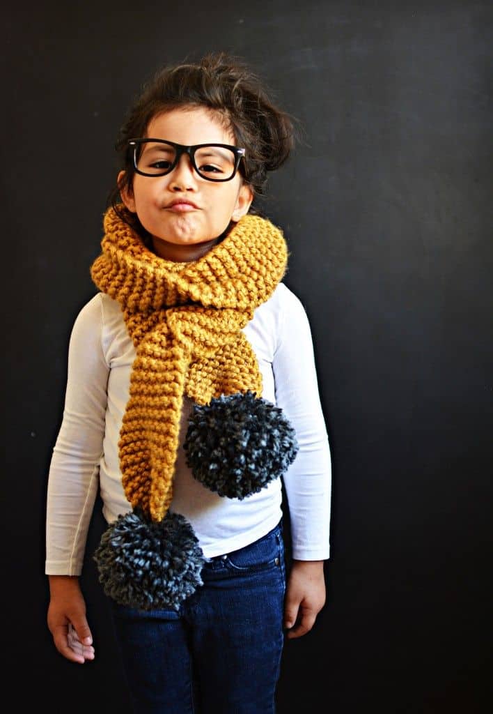 Chunky knitted pom pom scarf