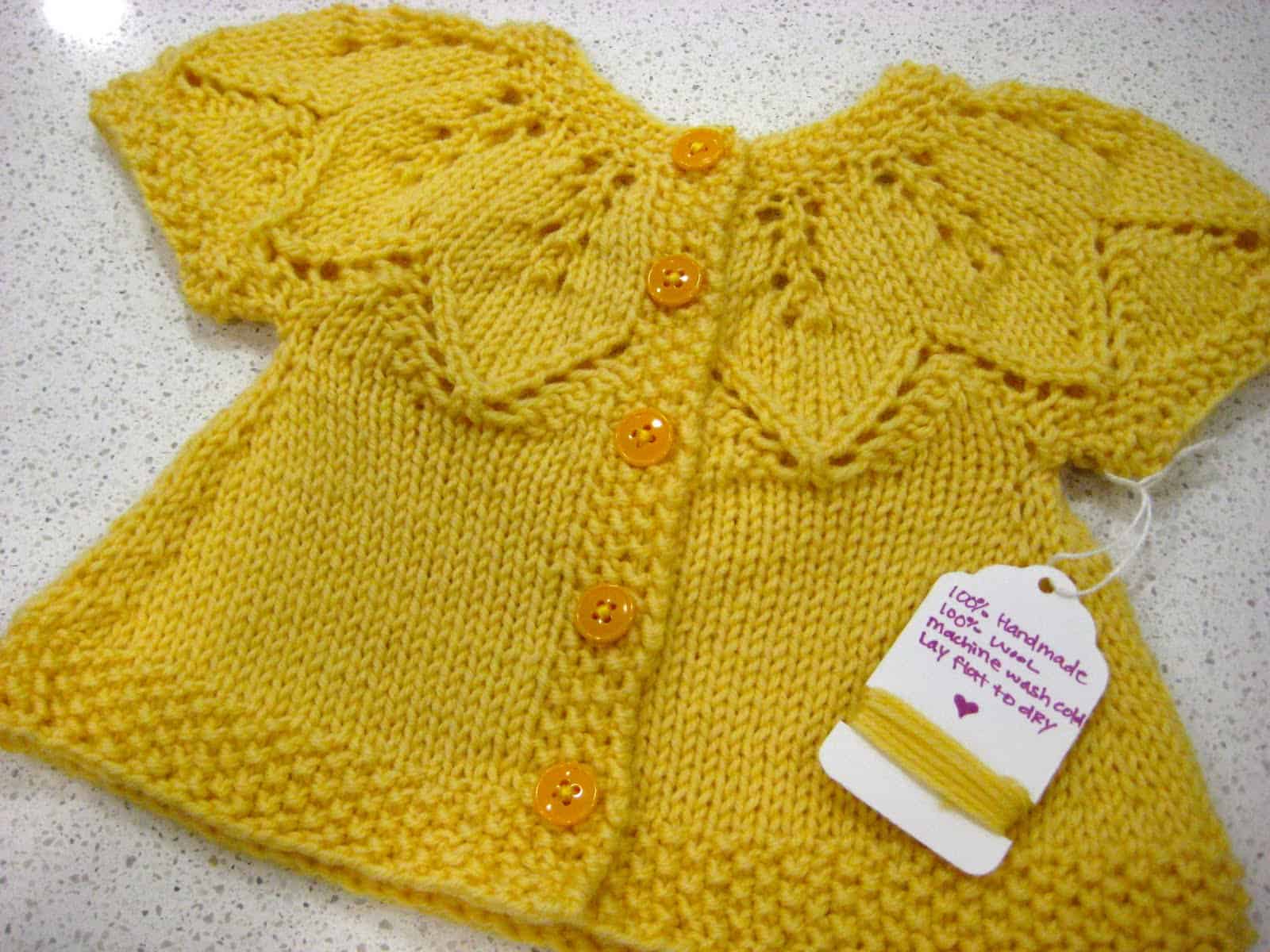 Lace yoke and seed stitch border girls' sweater
