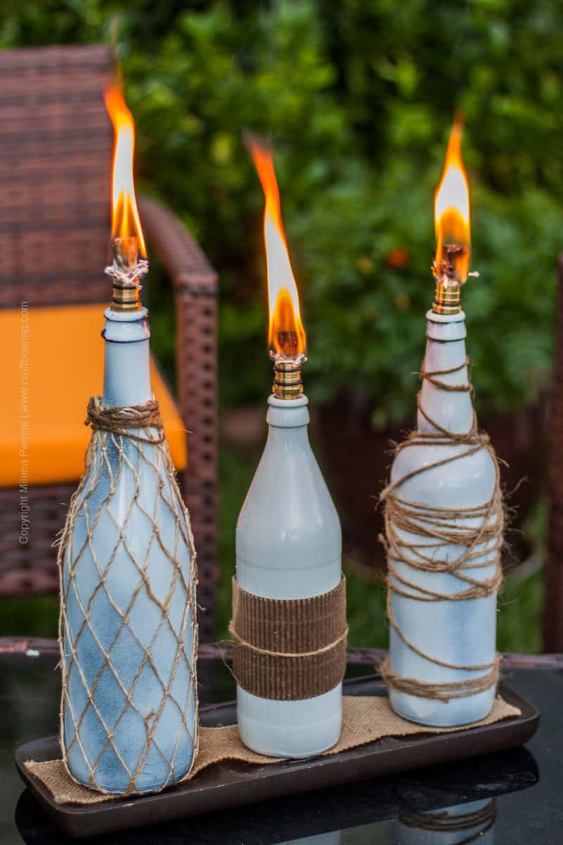 String wrapped beach bottle torches