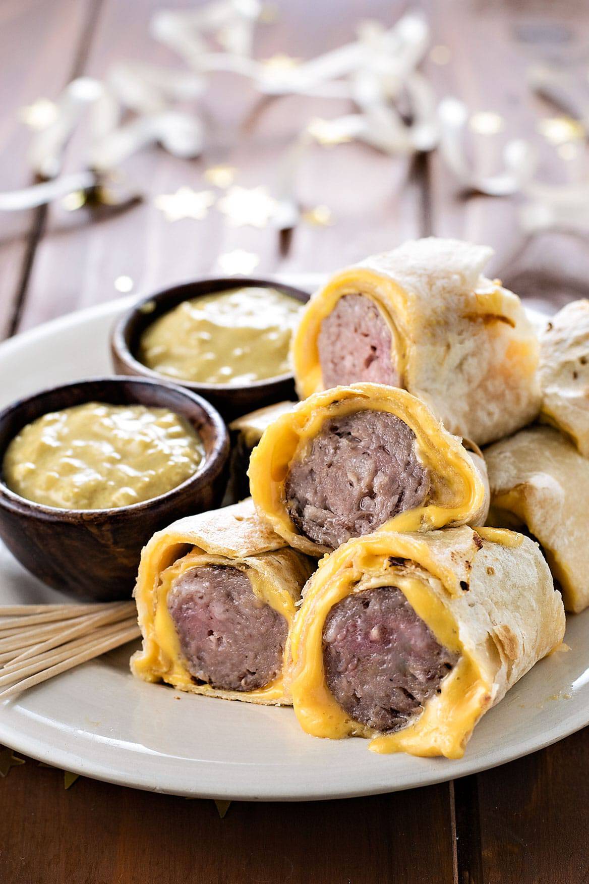 Tortilla wrapped bratwursts with homemade beer mustard