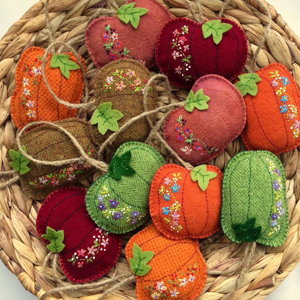 A basket of felt pumpkins thanksgiving table centerpieces