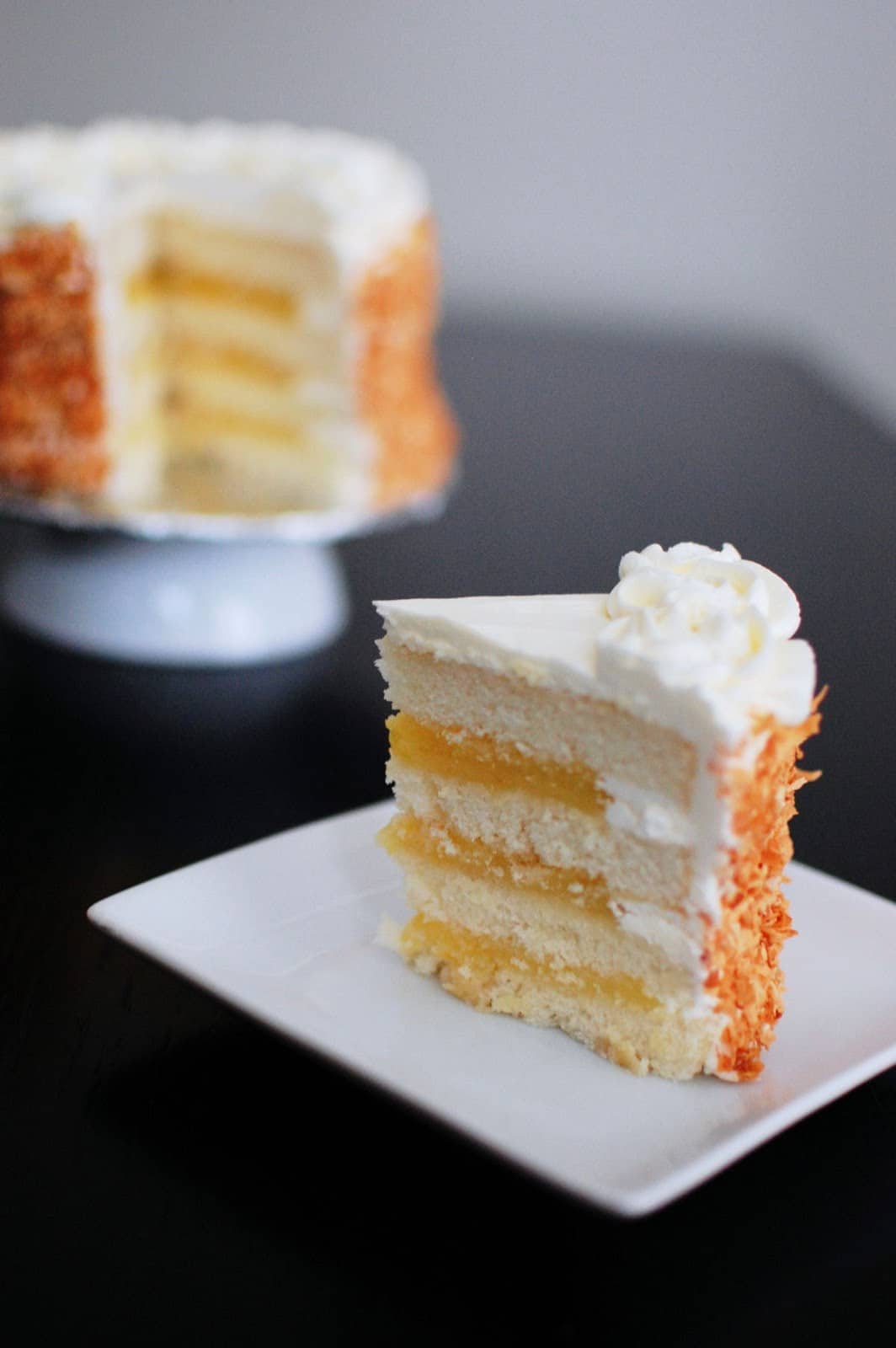 Coconut layer cake filled with lemon curd