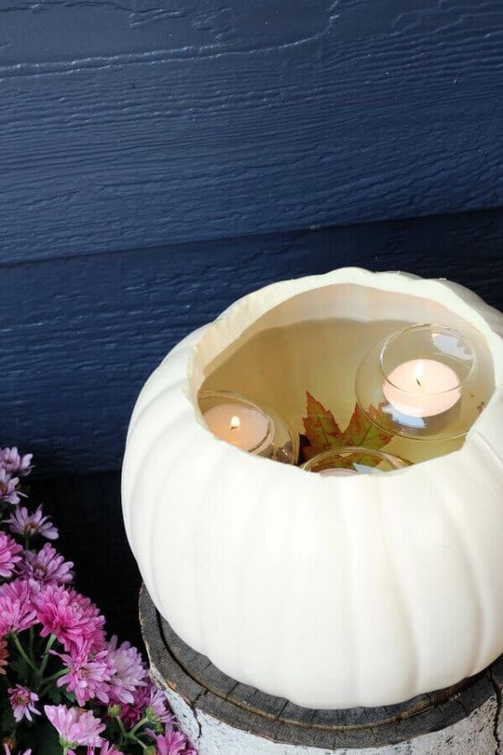 Faux pumpkin with floating votives diy thanksgiving centerpieces
