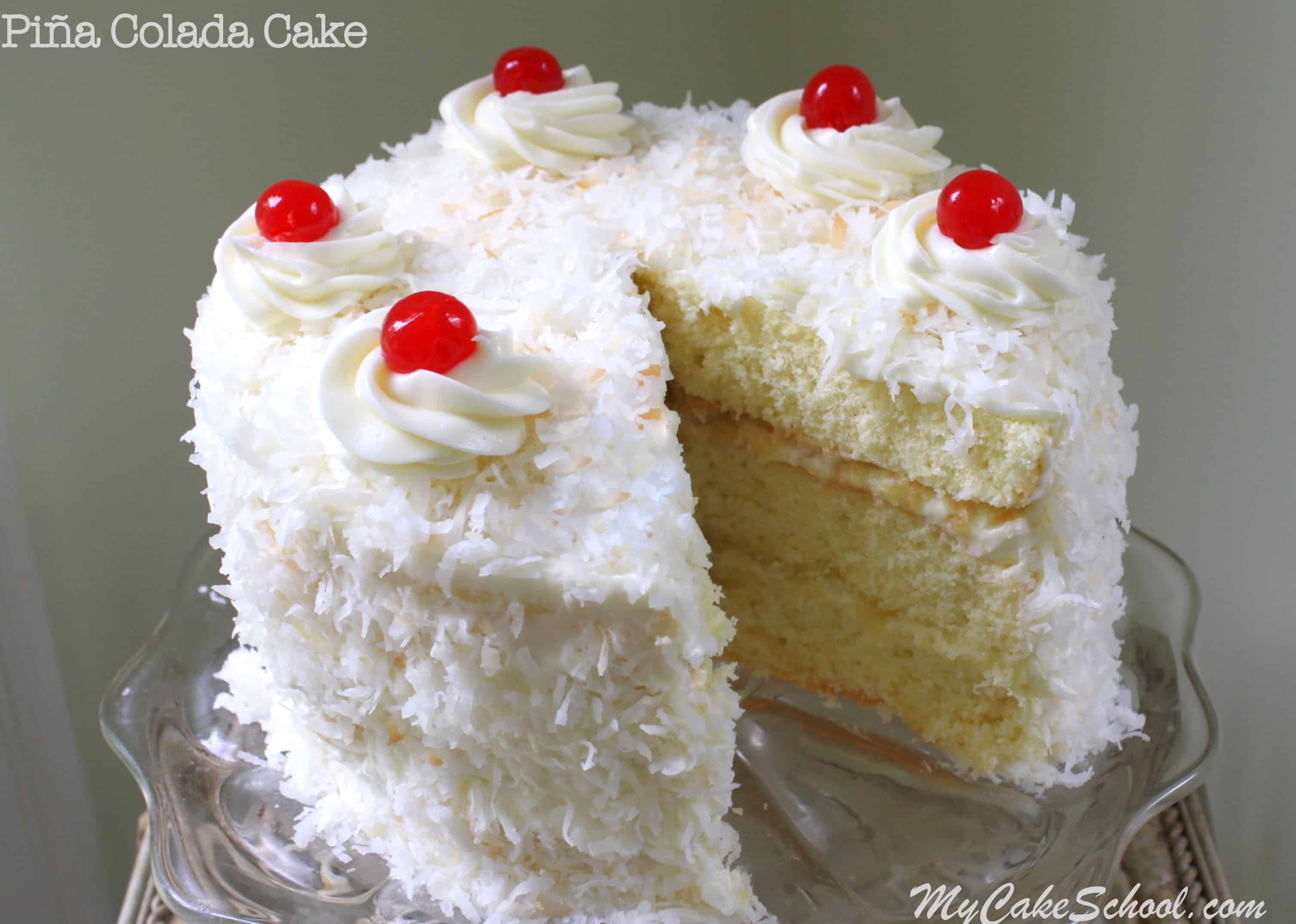 Pina colada cake with coconut icing and crushed pineapple filling