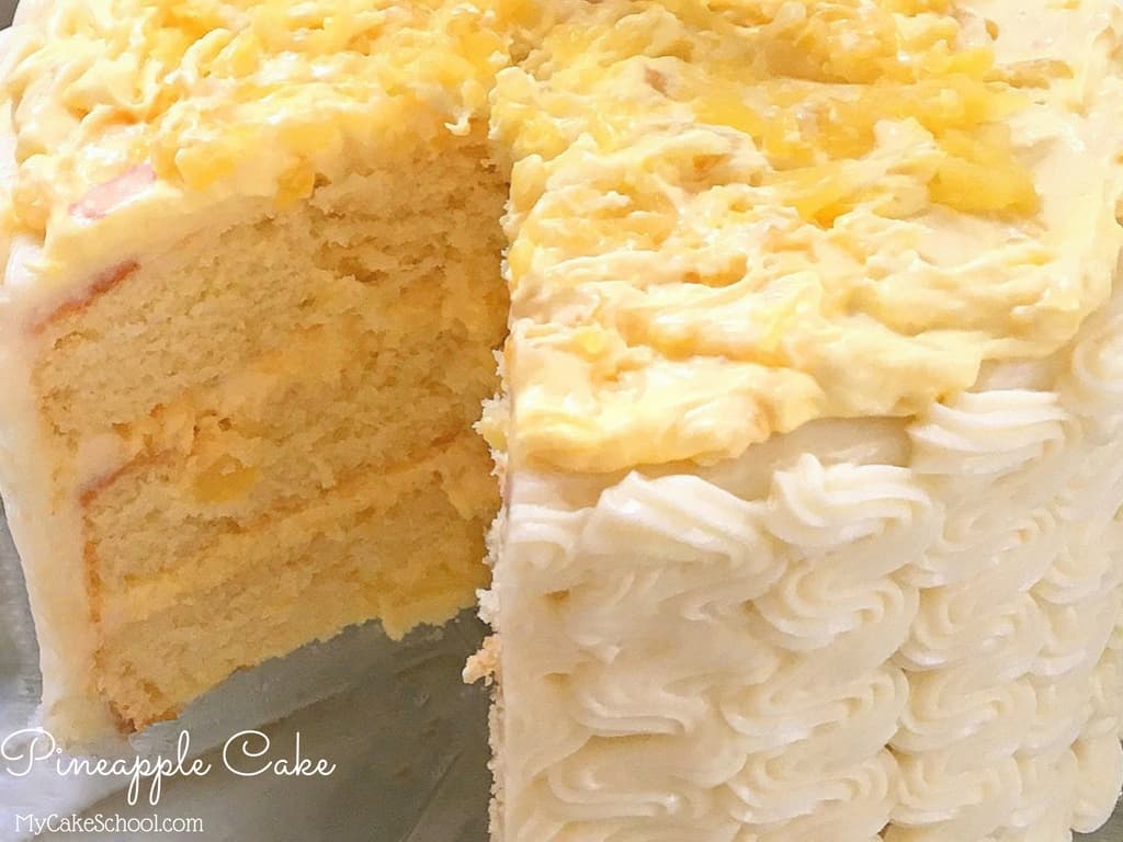 Pineapple layer cake with pineapple cream filling and cream cheese frosting