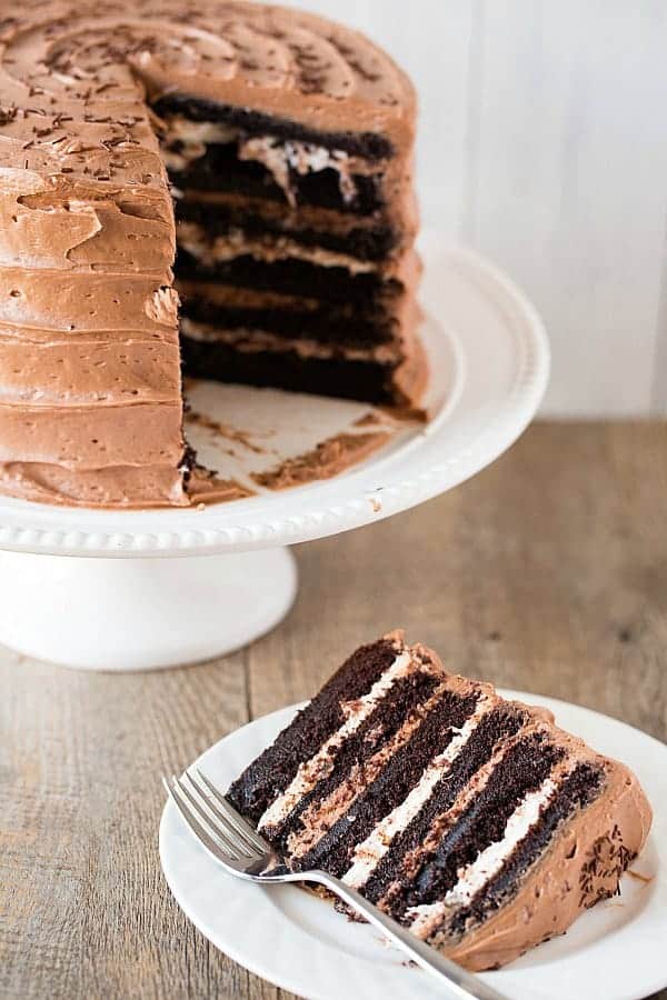 Six layer chocolate cake with toasted marshmallow filling and malted chocolate frosting