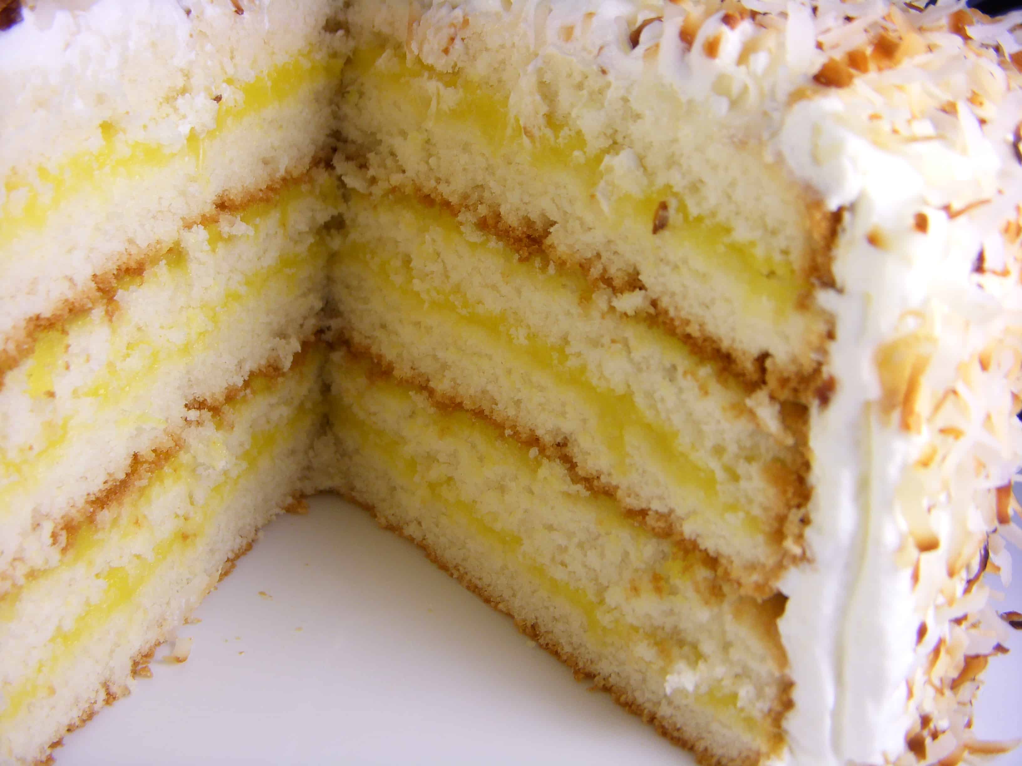 Six layer coconut cake with mango filling
