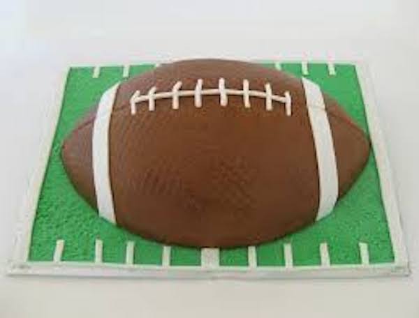 Smooth buttercream and fondant football cake
