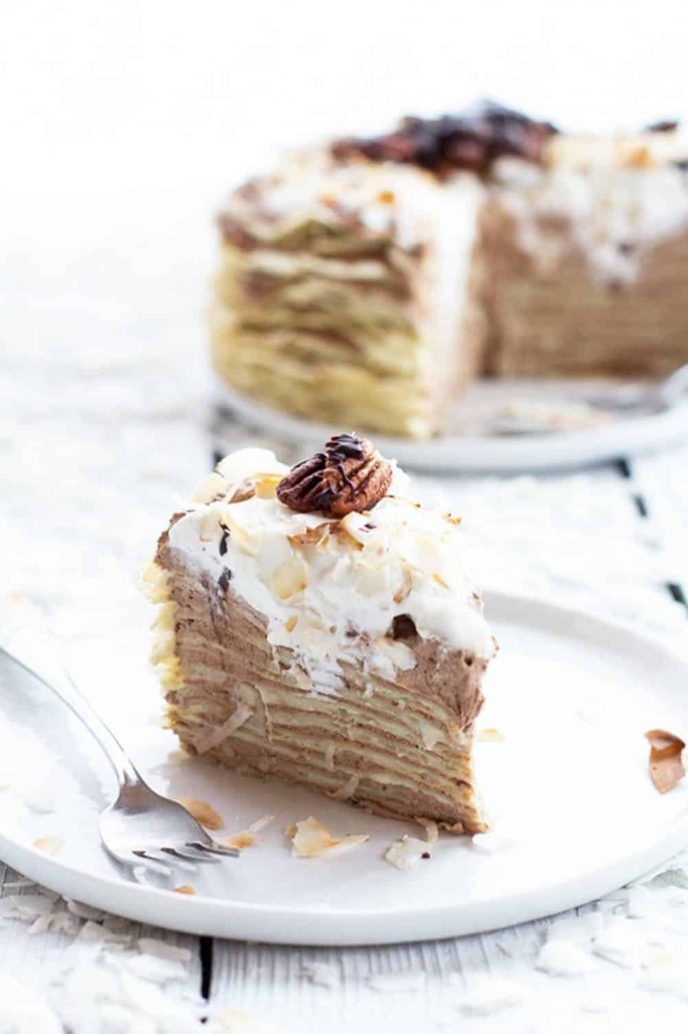 Toasted coconut cream rum and chocolate mousse crepe cake