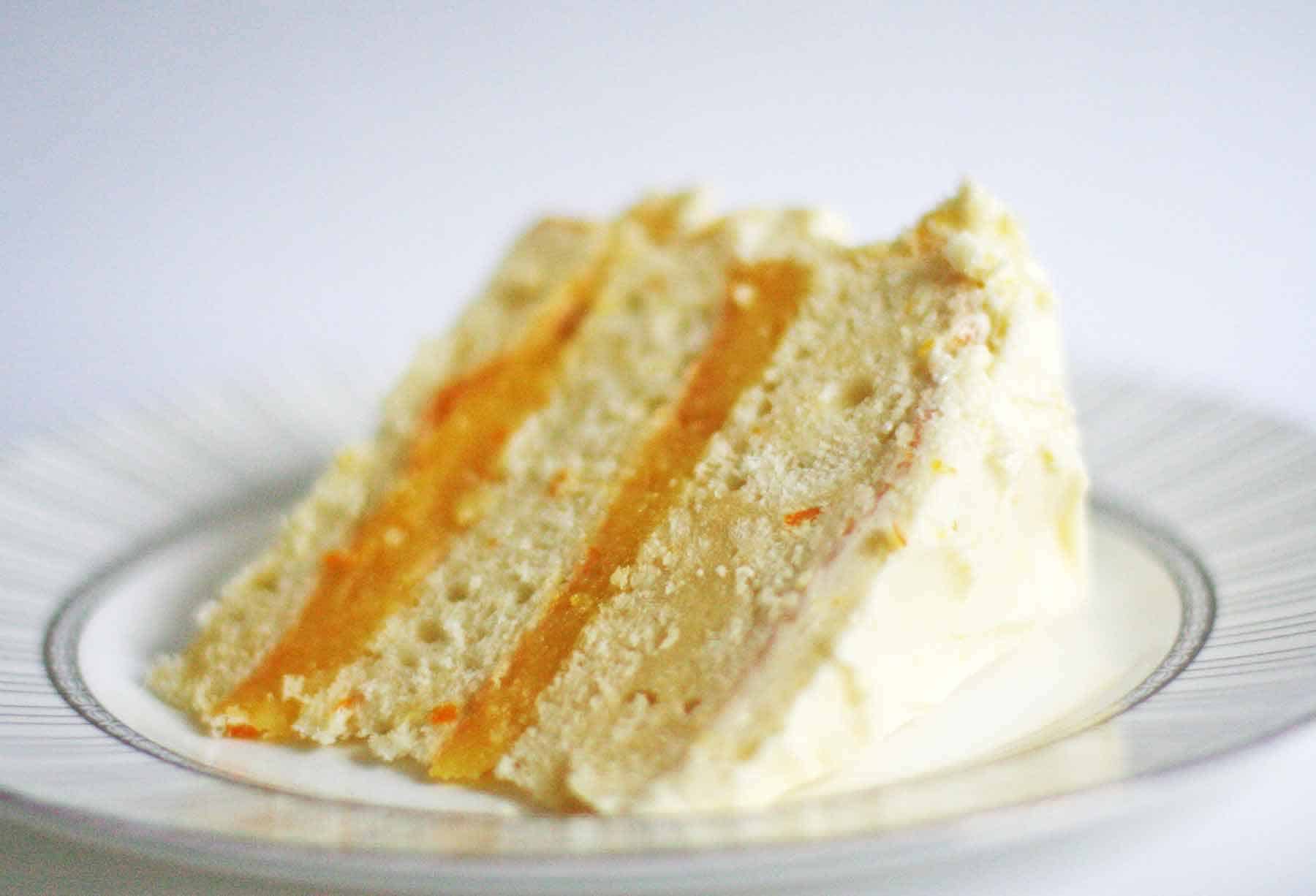 Triple layer white cake with orange curd filling