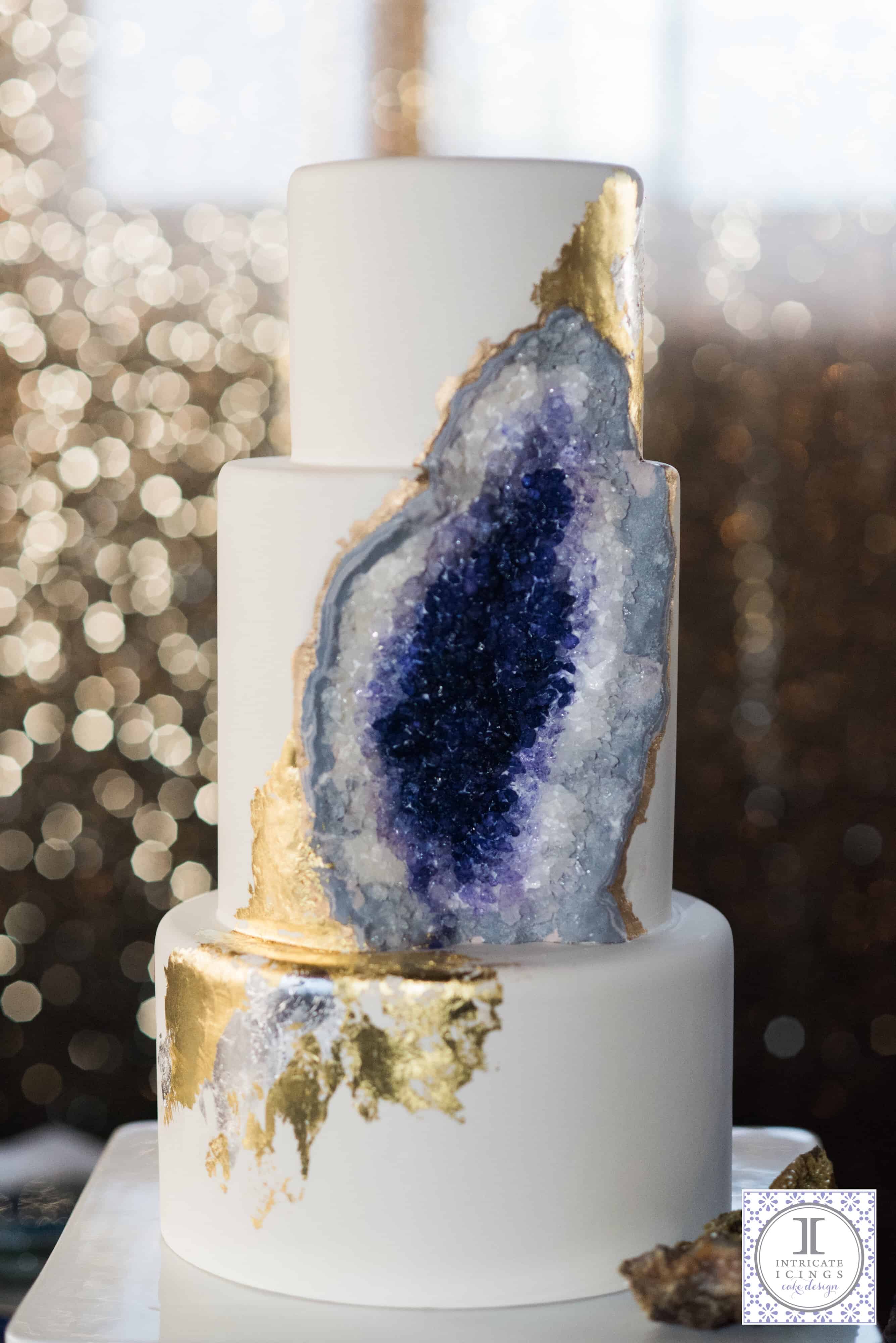 White, purple, and gold geode cake