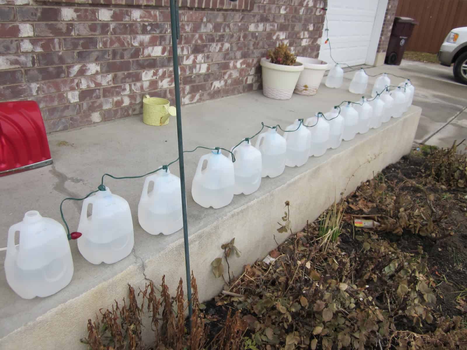 Milk jug christmas porch lanterns