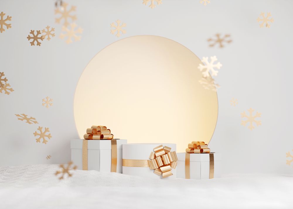 White and gold christmas decorations gifts with golden ribbons