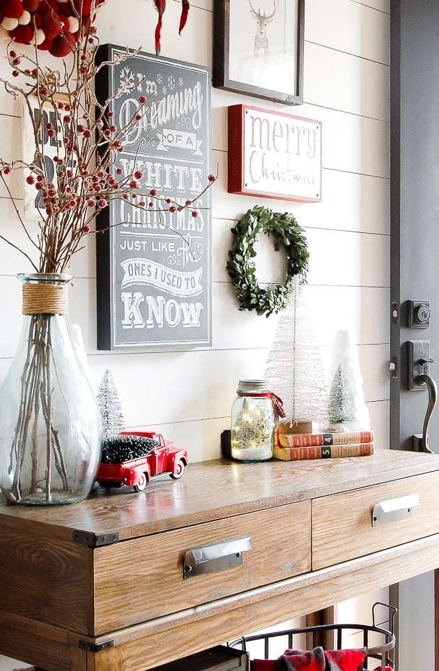 Red accented christmas gallery wall