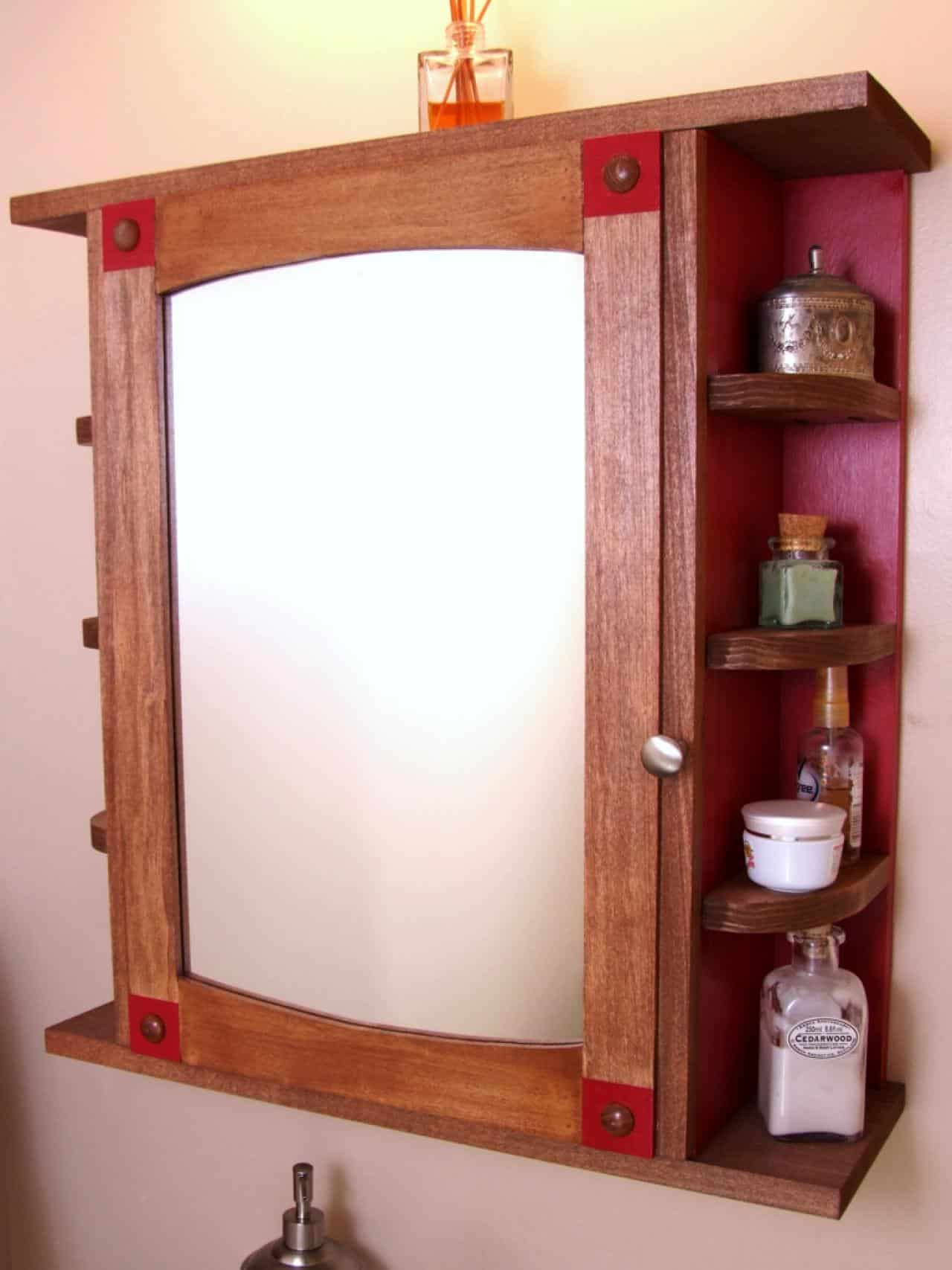 Wooden medicine cabinet with mirror door and shelves