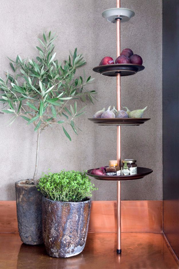 Tiered floor to ceiling trays
