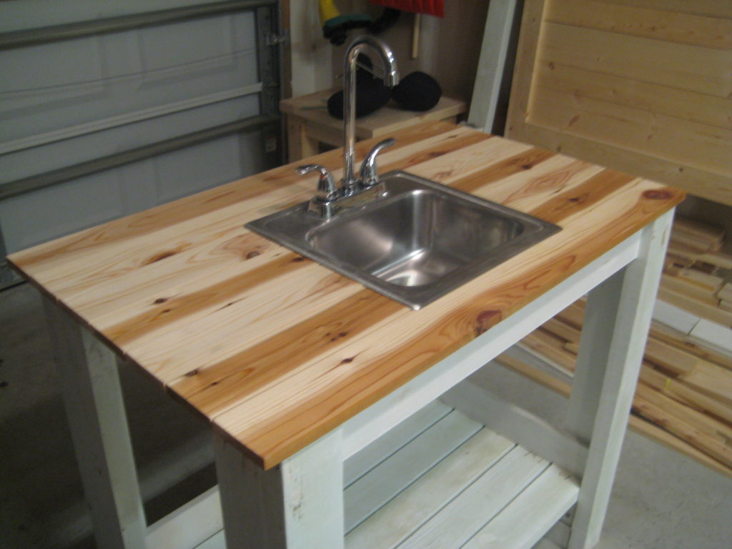 outdoor kitchen sink station woth cabinet