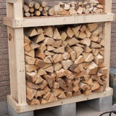 Tall timber and cinder block wood rack