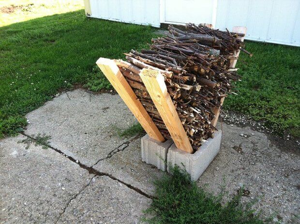 V shaped branch rack stabilized with cinder blocks