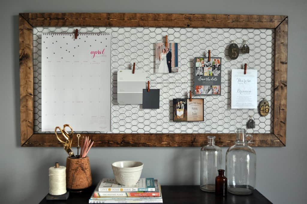 Wood and chicken wire office memo board
