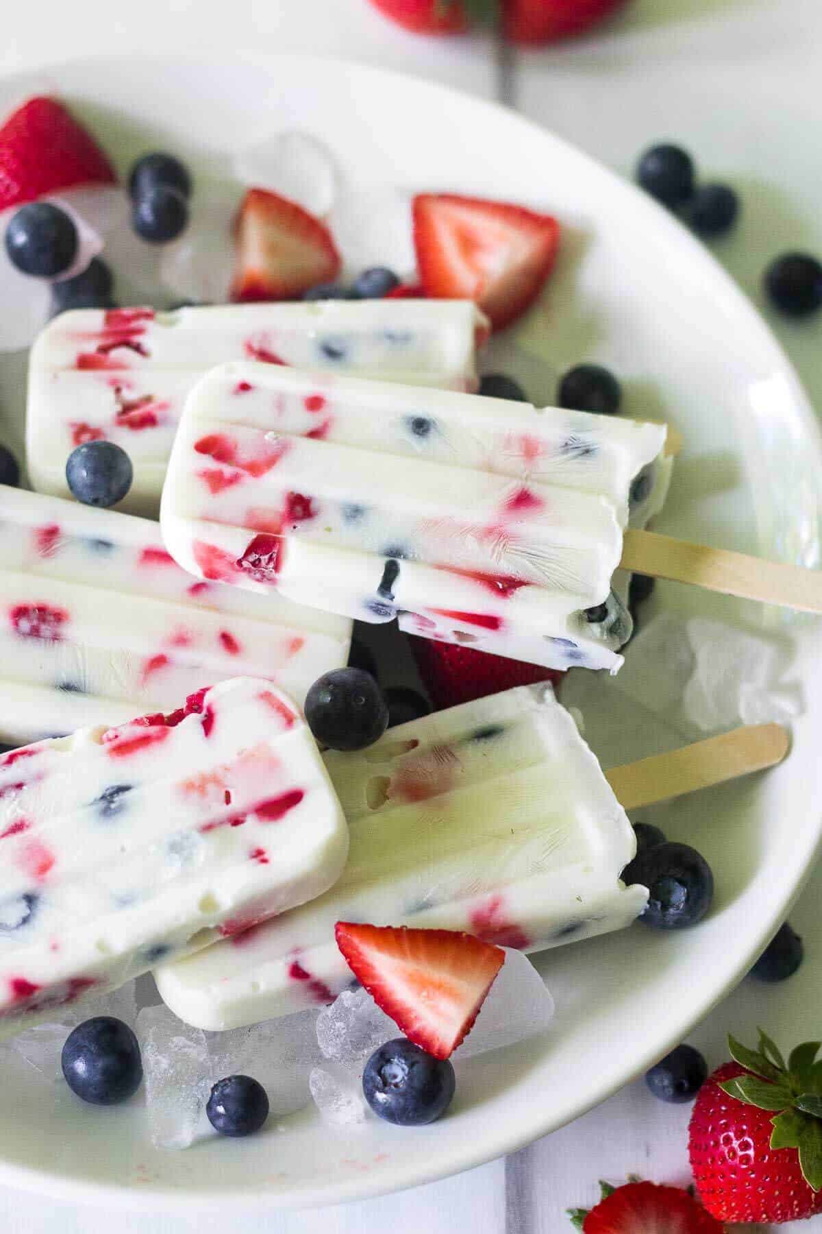Red, white, and blue yogurt popsicles