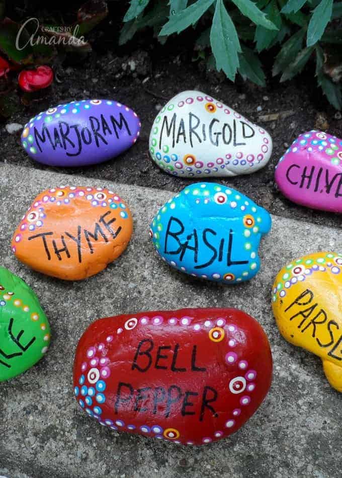 Unique painted rock garden markers