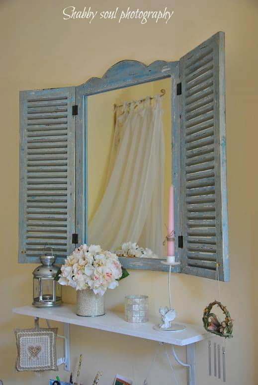 Bathroom mirror with vintage shutters