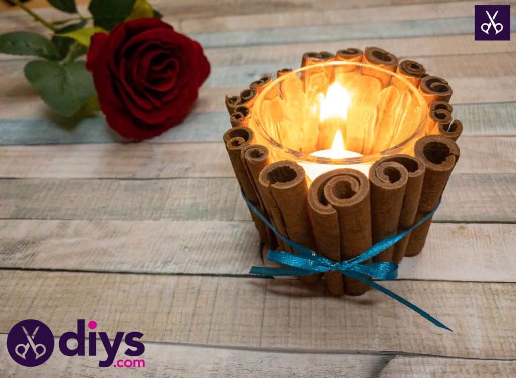 Decorate the christmas table with a cinnamon stick candle holder