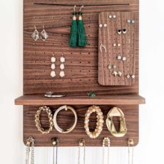 Wall mounted wooden peg, shelf, and holes organizer