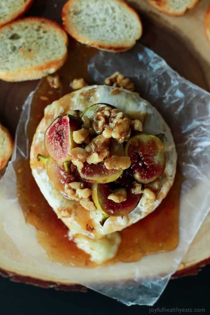 Baked brie with rosated fig, walnut, and honey topping