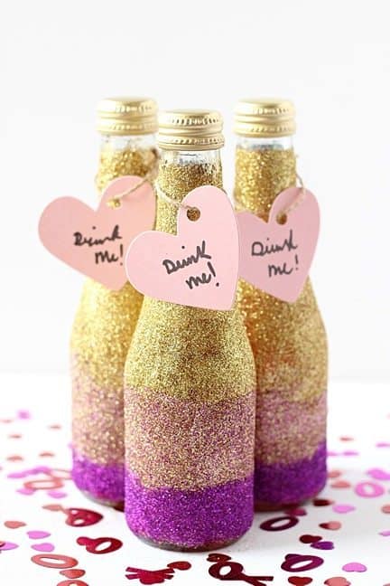 Glittered mini champagne bottles