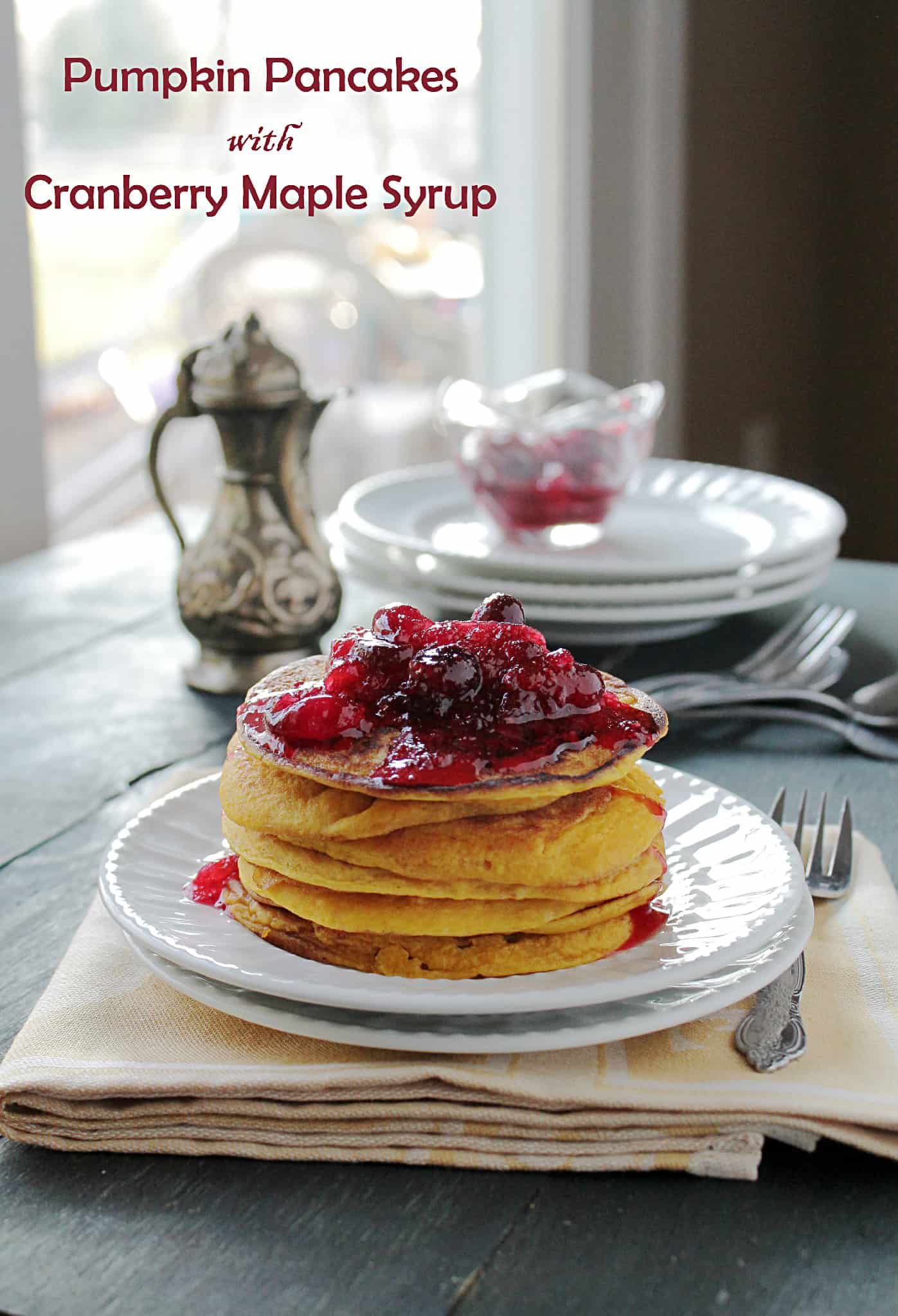 Pumpkin pancakes with cranberry maple syrup