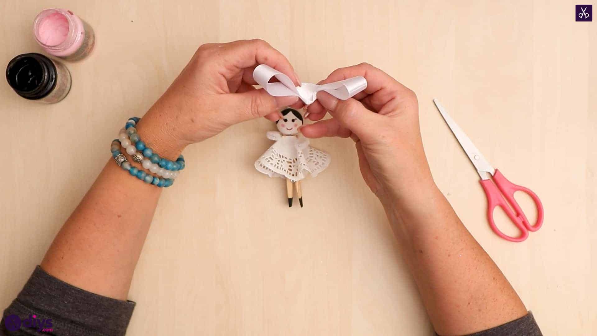 Diy clothespin angel ornament for christmas tree step 12