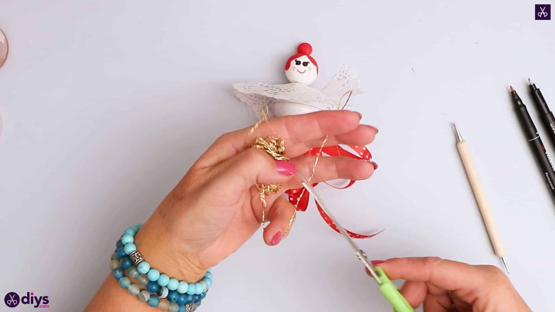 Doll ornament with bell step 9
