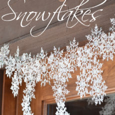 Hot glue and glitter dollar store snowflakes