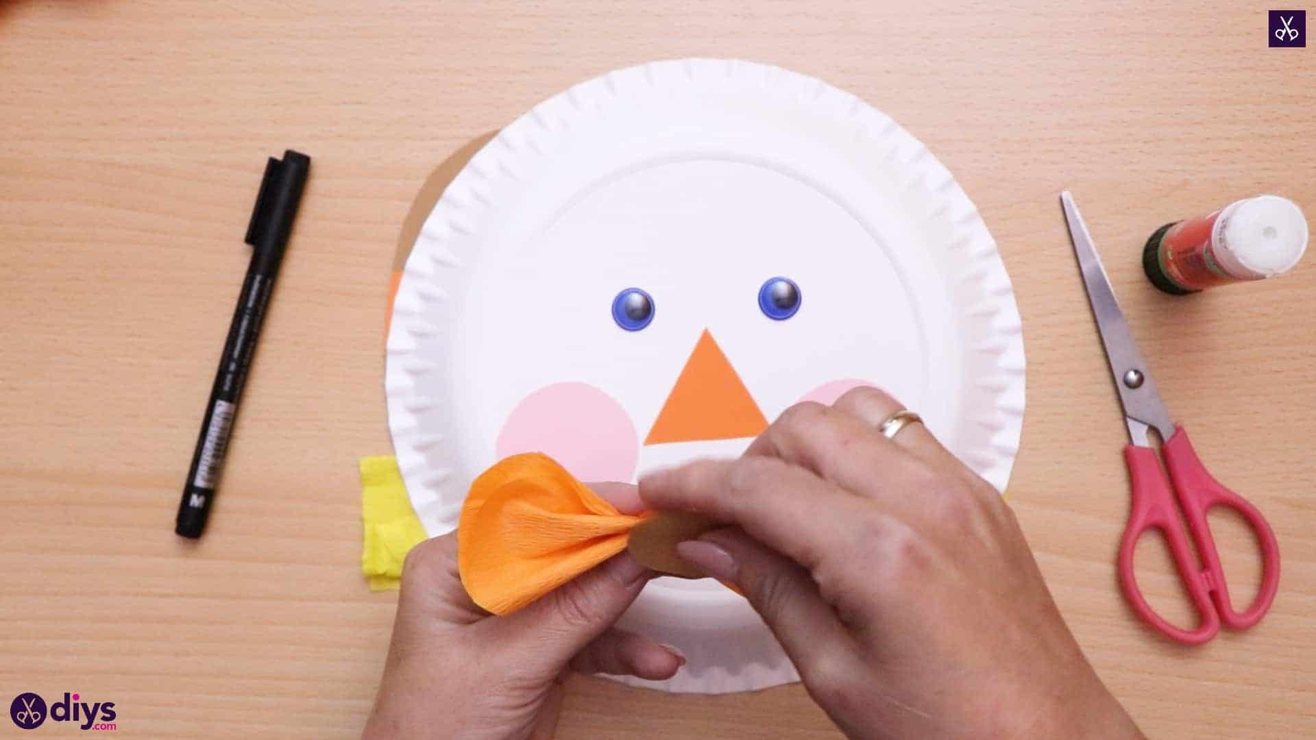 Paper plate scarecrow bow