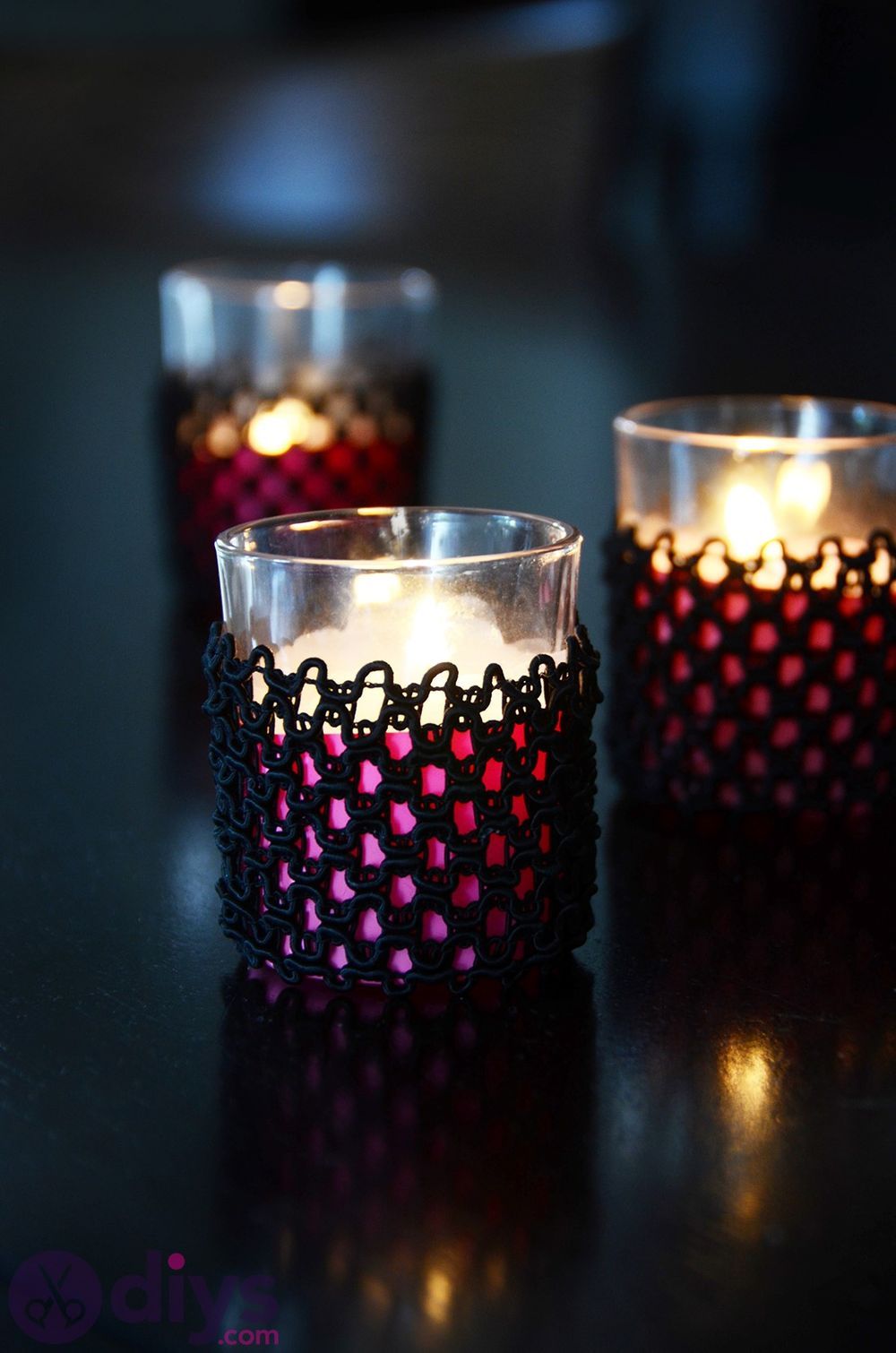 Glass votives with lace cover lighted christmas window decorations