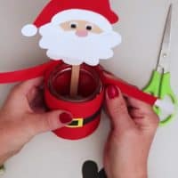 Paper santa candy holder glue hands