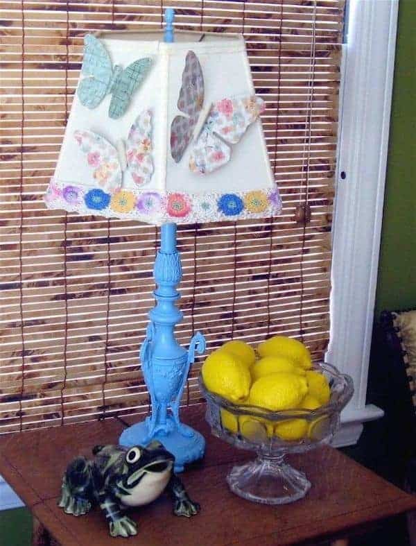 Vintage painted candlestick and wallpaper butterfly lamp