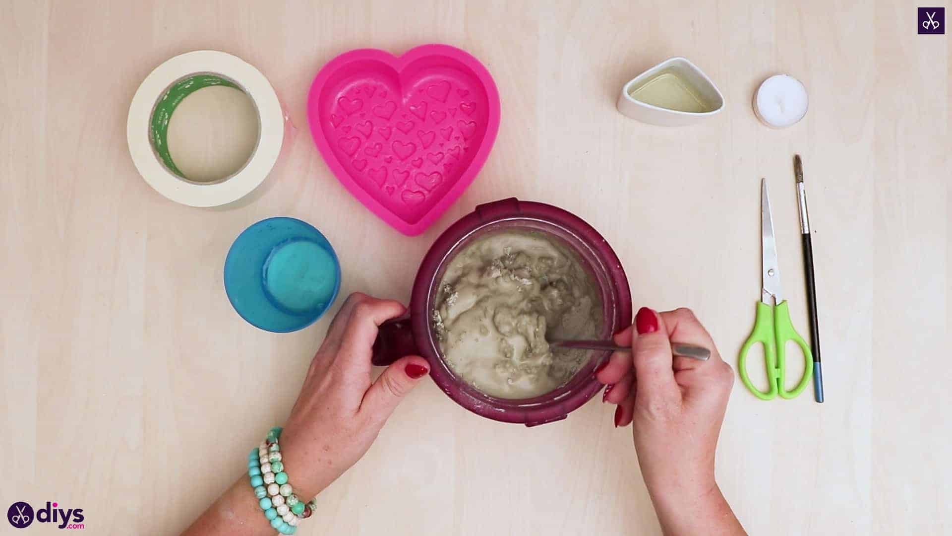 Diy concrete heart candle holder mixing