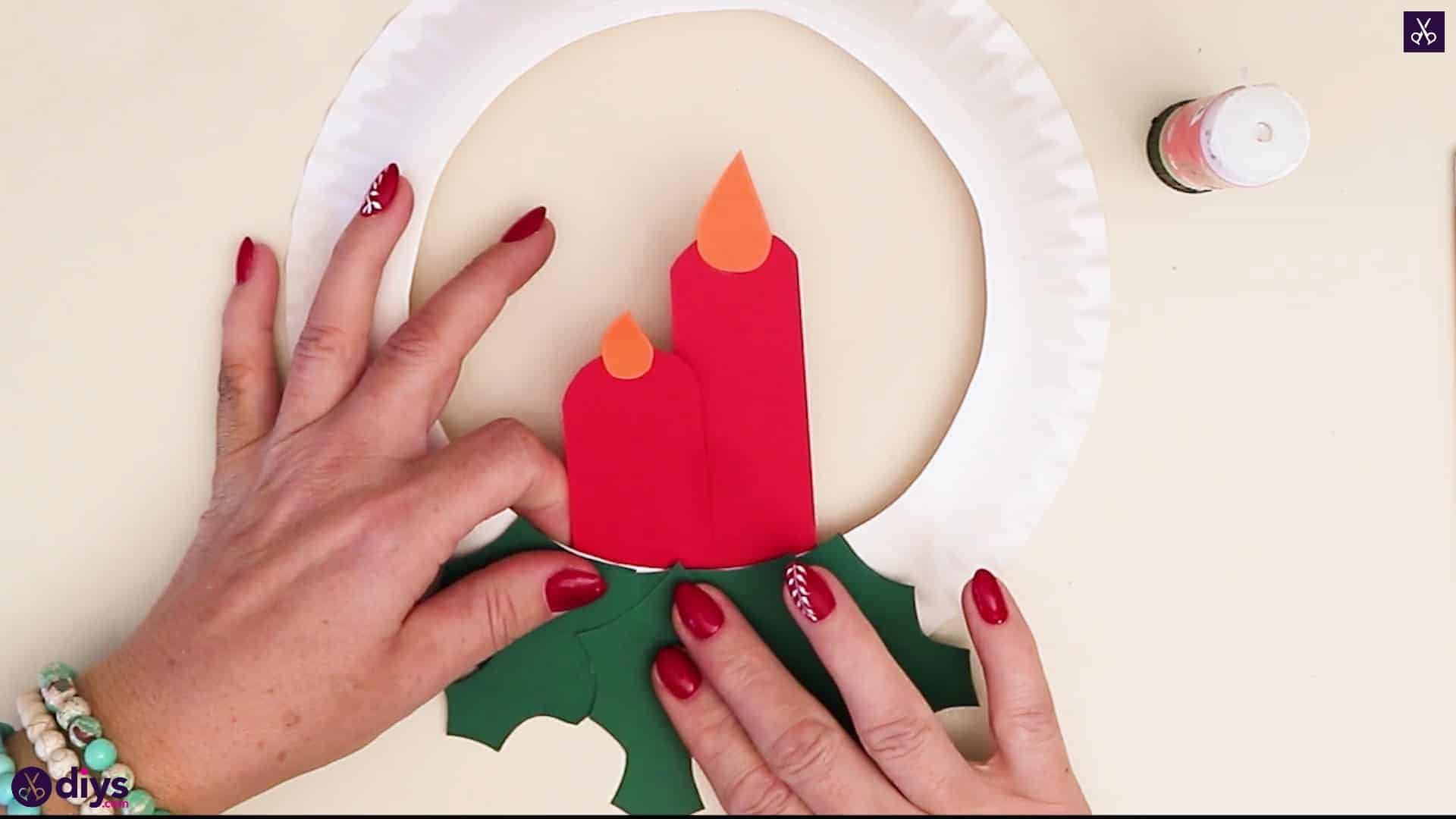 Paper plate wreath with a candle press bottom
