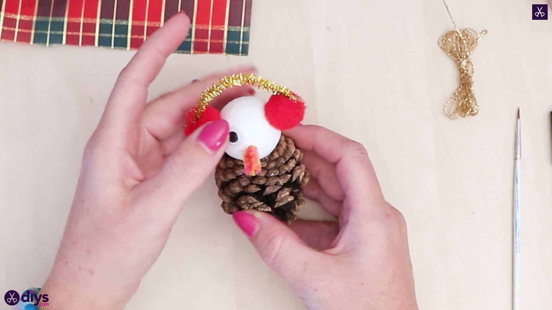 Pinecone snowman with headphones head attach