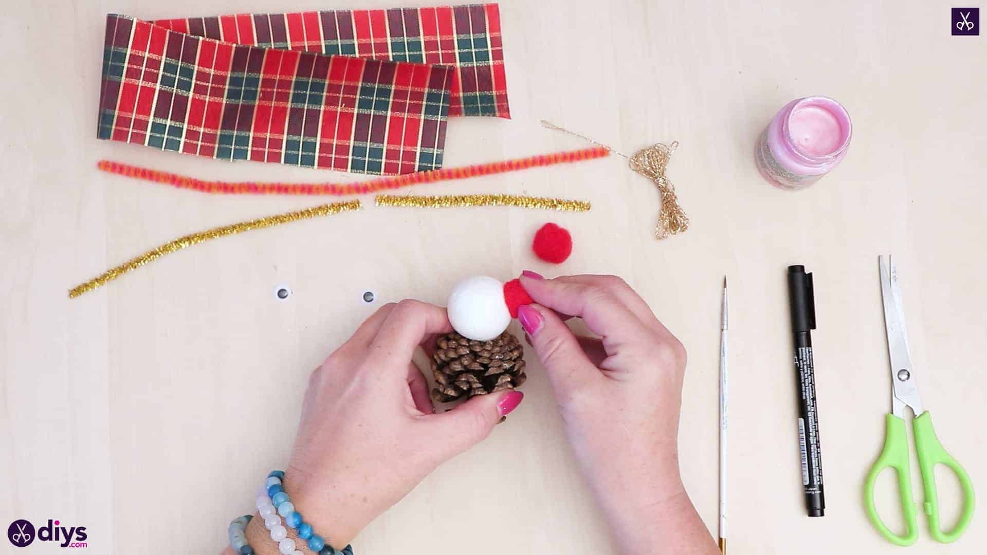 Pinecone snowman with headphones step 4c