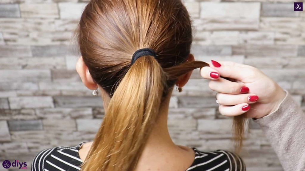3 easy ponytails for everyday wear twisted ponytail step 2