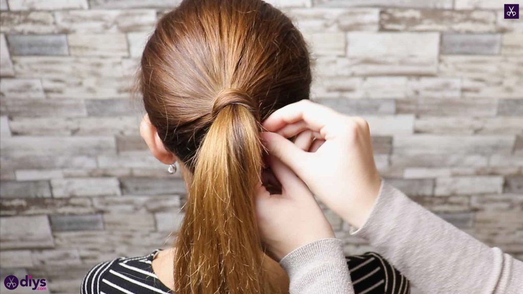 3 easy ponytails for everyday wear twisted ponytail step 2c