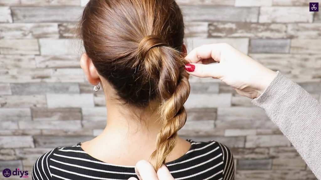 3 easy ponytails for everyday wear twisted ponytail step 4a