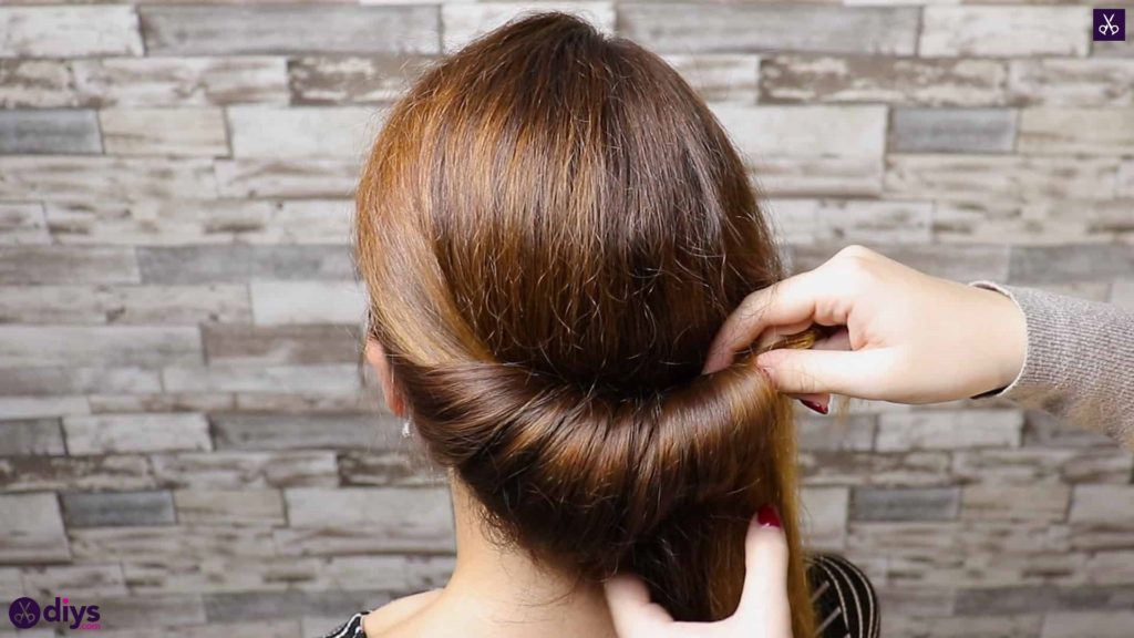 Beautiful summer bun with flowers hairstyle step 2